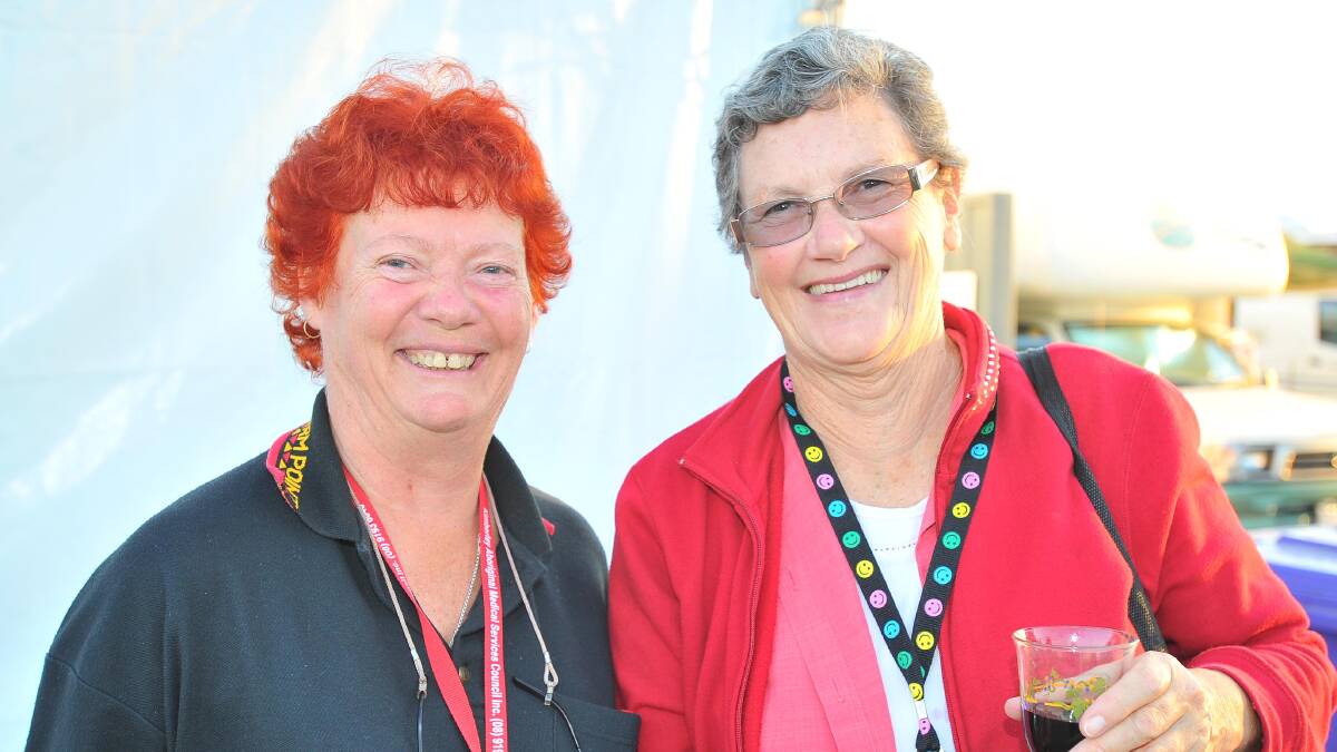 Ruth Coxall from Collie, Western Australia, and Helen Evans, from the Central Coast, enjoy a talk and a wine at the opening day of the Stone the Crows Festival. Picture: Kieren L Tilly