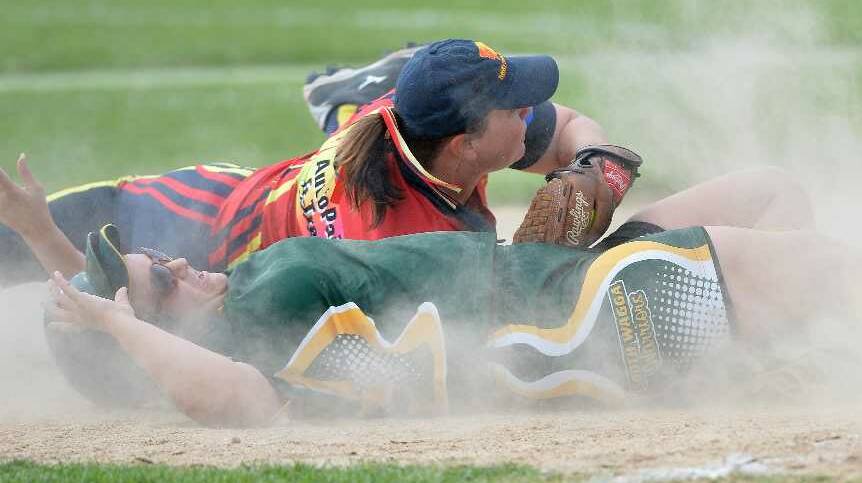 A GRADE: South Wagga's Louise Matheson is run out on third by Turvey Park's Kathryn Armstrong. Picture: Michael Frogley