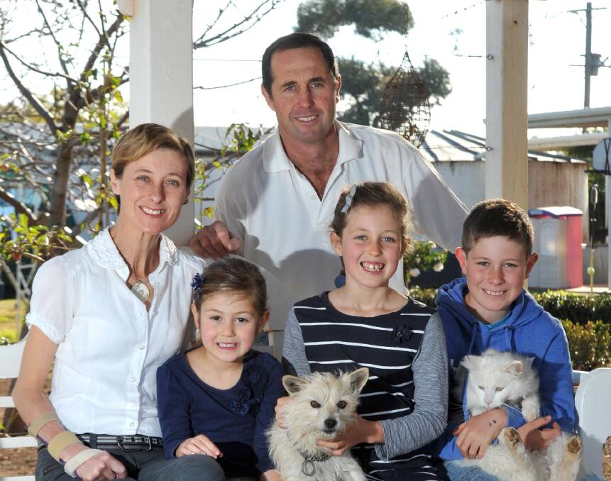 Kim and Geoffrey Hunt with children Phoebe, Mia and Fletcher. Picture: Les Smith