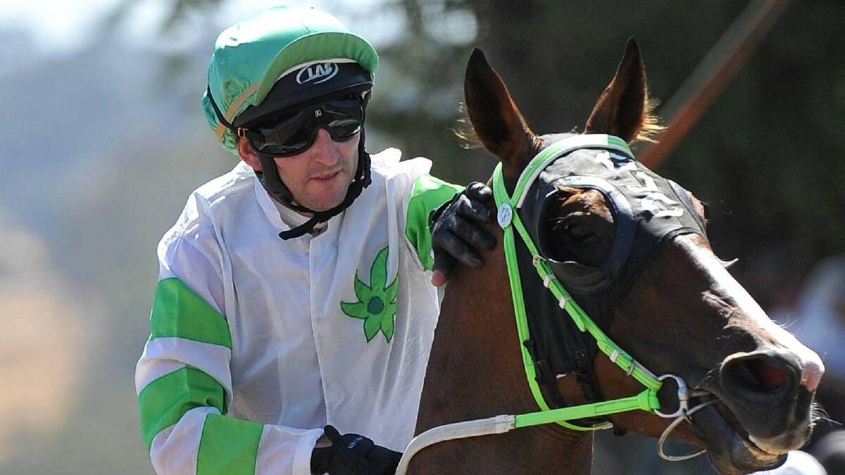 Jockey Andy Bloomfield gives Miss Bemuse a pat after winning the Tumbarumba Cup on Saturday. Picture: Michael Frogley