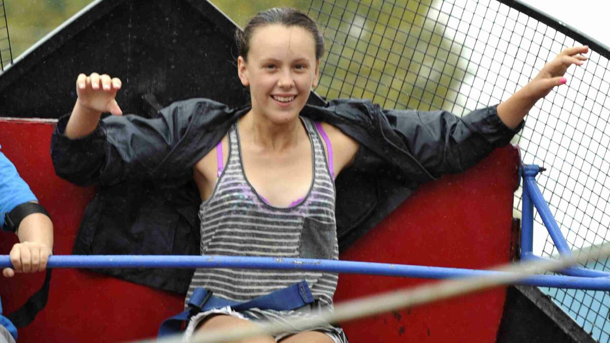 Brooke Day, 14, from Tumut enjoys the Pirates of the Caribbean ride at the Gundagai show. Picture: Les Smith