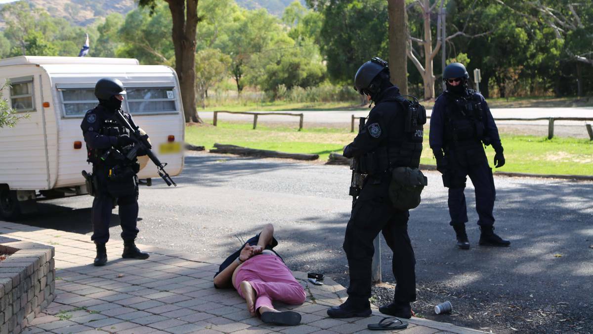 Police arrest one of the three accused near Gundagai. Picture: NSW Police
