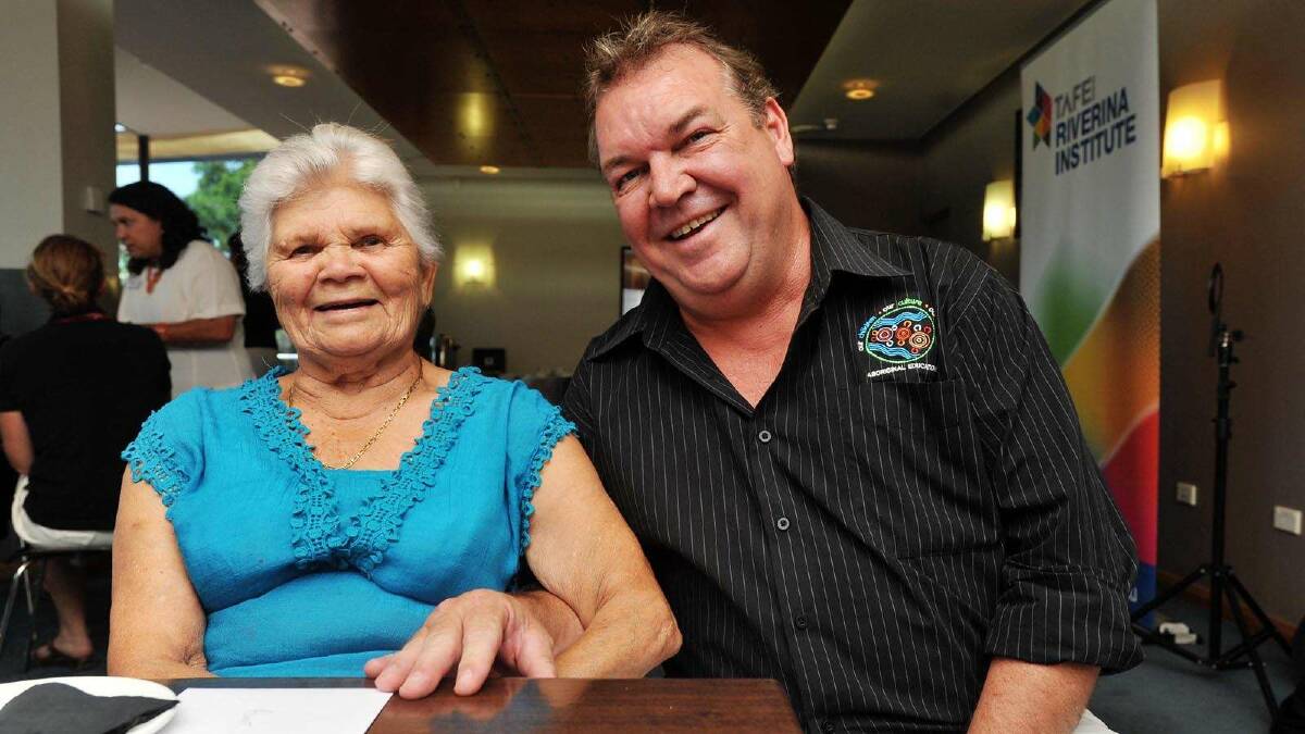 Auntie Isabel Reid and Mark Cunningham, an Aboriginal workplace and community development manager, catch up at an IPROWD Projects day. Picture: Alastair Brook