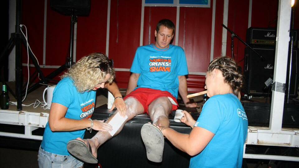 Athol Bush from Hay has his legs waxed as part of a World's Greatest Shave fundraiser. Picture: Chris Huntly