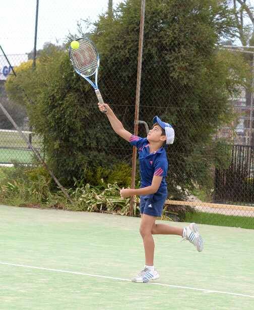 Harry Richman serves as he plays for the Bolton Park Jets in Division 1C. Picture: Jacinta Coyne