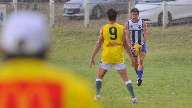 Rain hammers down during the Charity Shield game between Coolamon and Temora at Narrandera. Picture: Kieren L Tilly