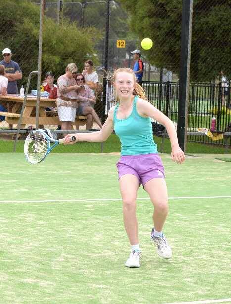 Sophie Coates is all smiles, even mid-game, at tennis on Saturday. Picture: Jacinta Coyne