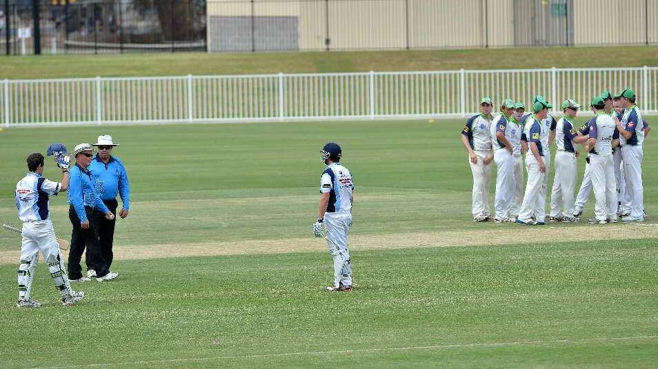 Joel Robinson continues to remonstrate with the umpires as he reluctantly leaves the field during the South Wagga v Wagga City game at Robertson Oval on Saturday. Picture: Michael Frogley