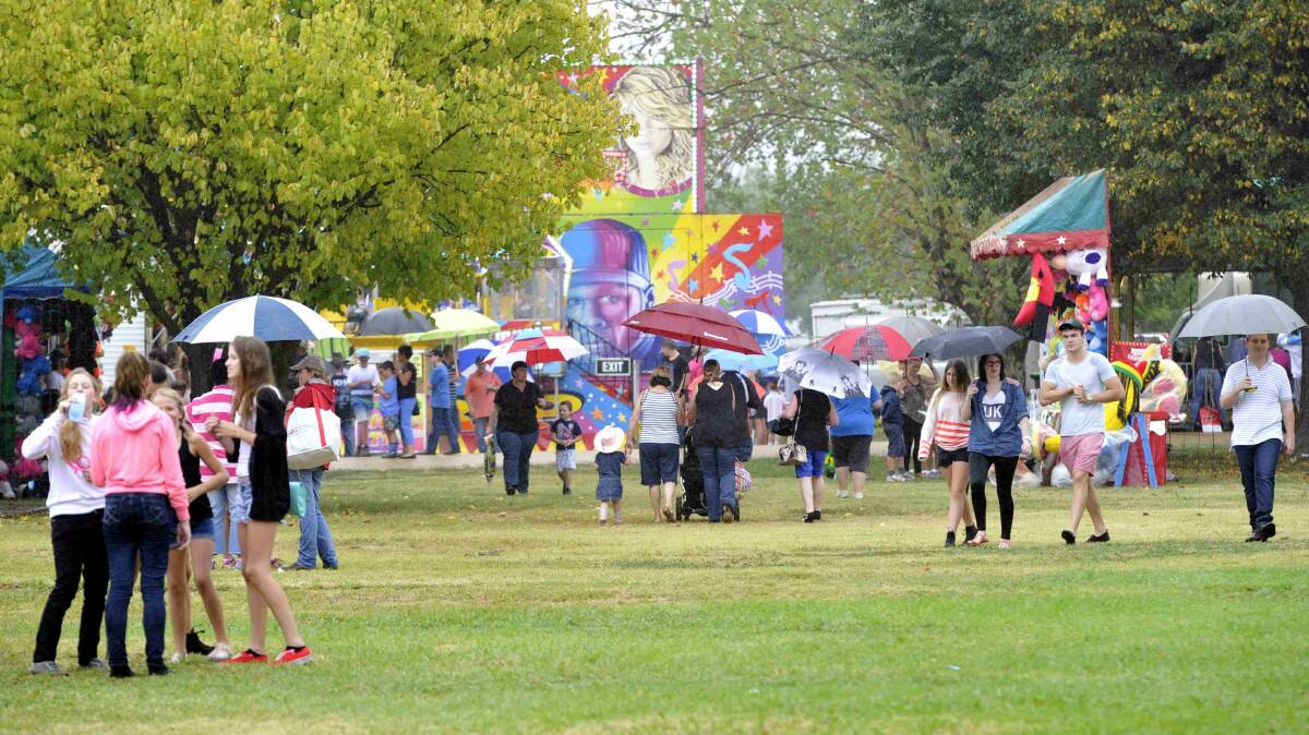 Rain didn't stop the crowds from turning out for the Gundagai show. Picture: Les Smith