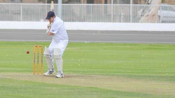 Marty Loy bats for St Michaels in the semi-final game between Lake Albert and St Michaels. Picture: Kieren L Tilly