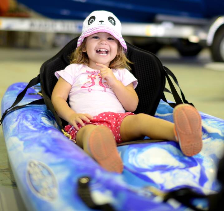 Isabella Bretherton really wanted her mum and dad to buy her this kayak at the leisurefest expo at the weekend. Picture: Jacinta Coyne