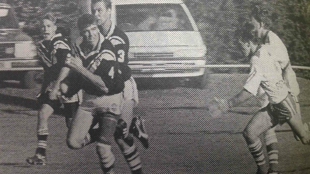 Magpies captain-coach David French has centre partner Gavin Price-Jones and another player in support as Temora halfback Danny Phillips attempts to stop the move at Harris Park.