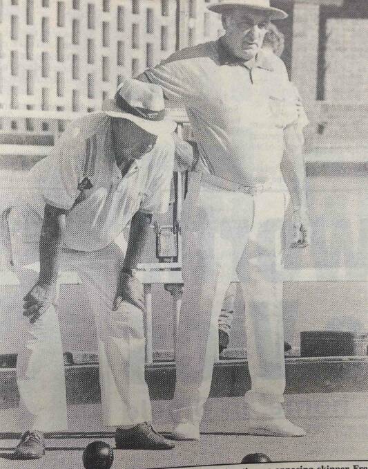 Jim Grant from Wagga RSL gets a close look at the situation as opposing skipper Frank Weigand from South Wagga watches the next bowl come down the green.
