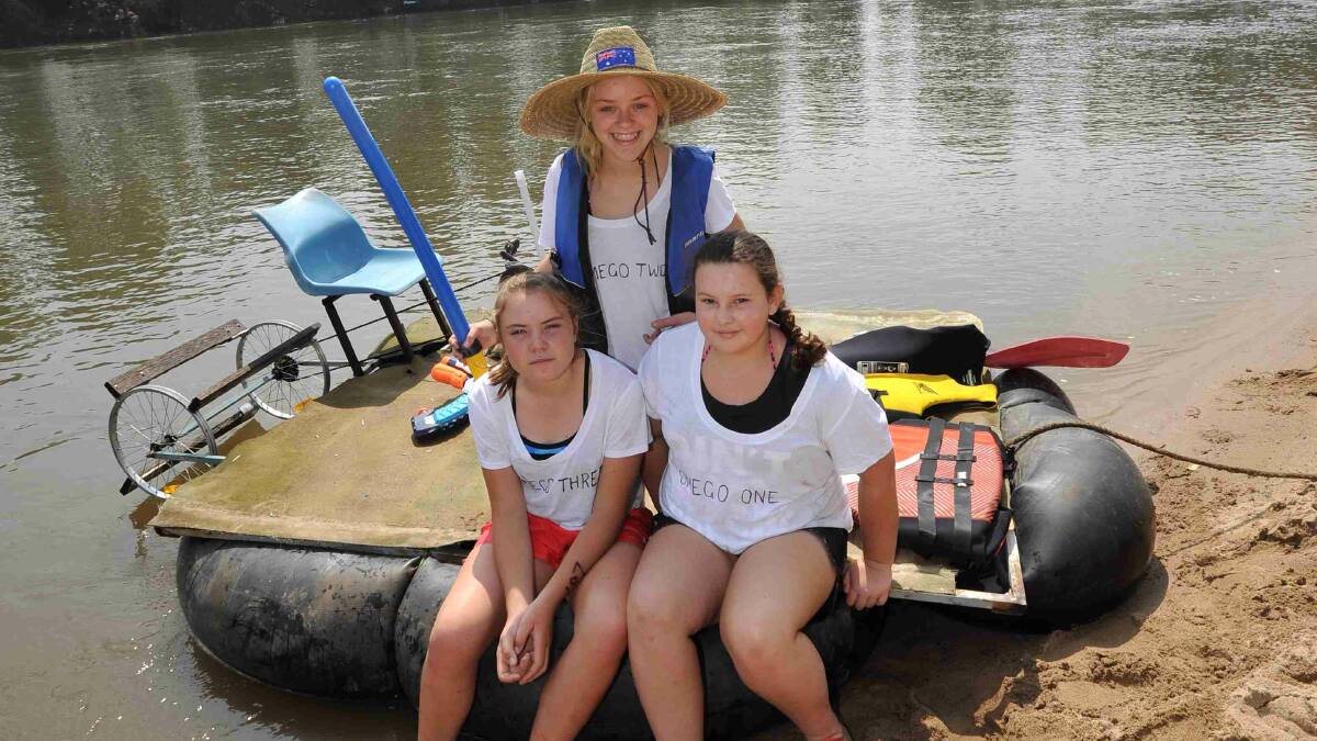 First place juniors Lucy Kell, 13, Hailey Wailes, 13, and Casey Jeffree, 12, with their trusty craft, Omega Three. Picture: Michael Frogley