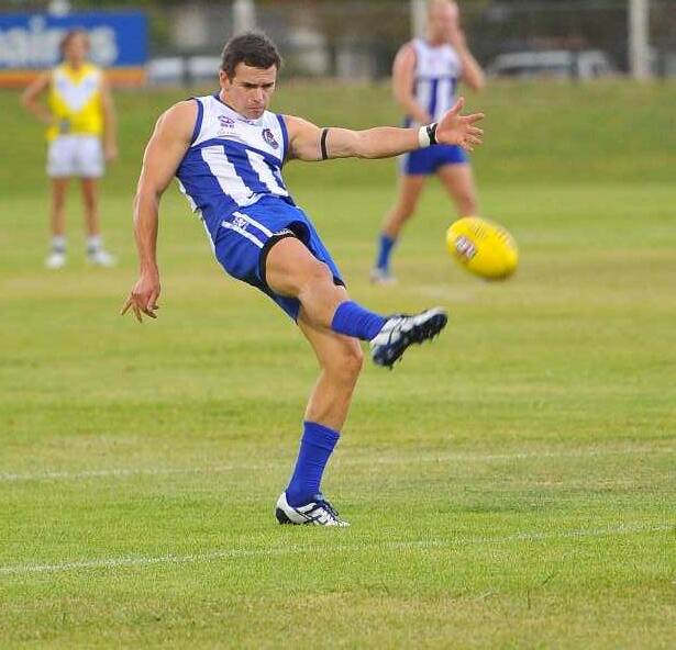 Temora's Matt Wallis gets boot to ball in the Charity Shield game between Coolamon and Temora at Narrandera. Picture: Kieren L Tilly