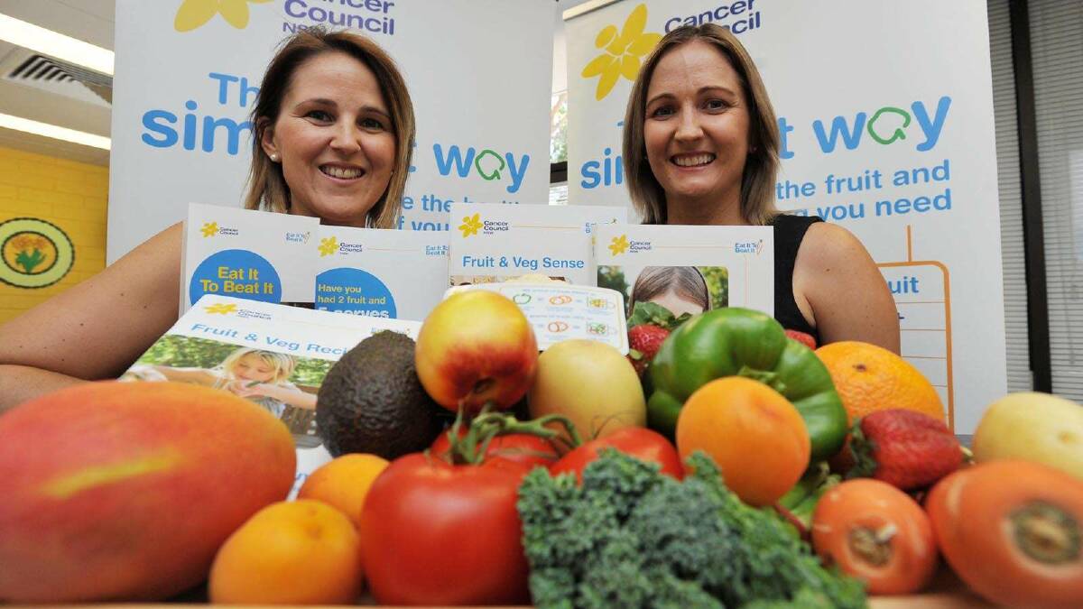 Cancer Council volunteer Sandy Gault and project officer Avril Grintell promote the Eat it to Beat it program. Picture: Alastair Brook