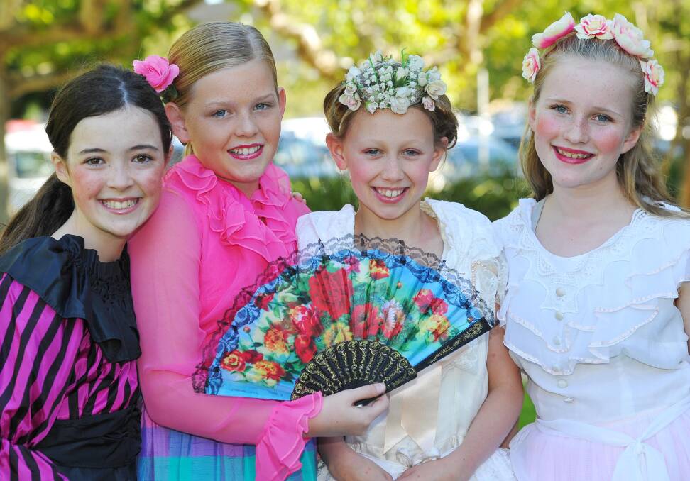 Amy O’Halloran, 10, Madeleine Logan, 11, Hannah Billett, 11, and
Caroline Smith, 10, prepare for the start of The Frog Prince, the latest production from the Wagga Children’s
Theatre Workshop. Picture: Kieren L Tilly