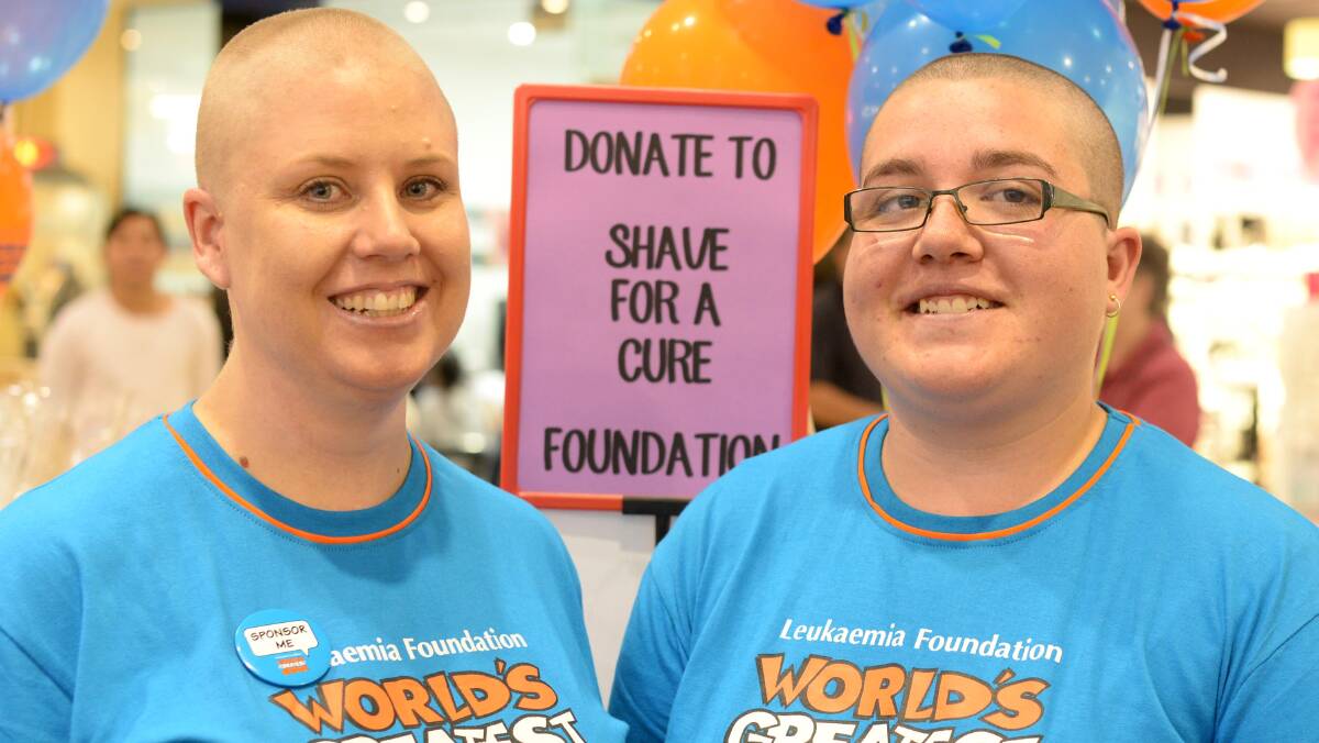 Kellie Roberts and Sophie Morton shaved for a cure. Picture: Jacinta Coyne
