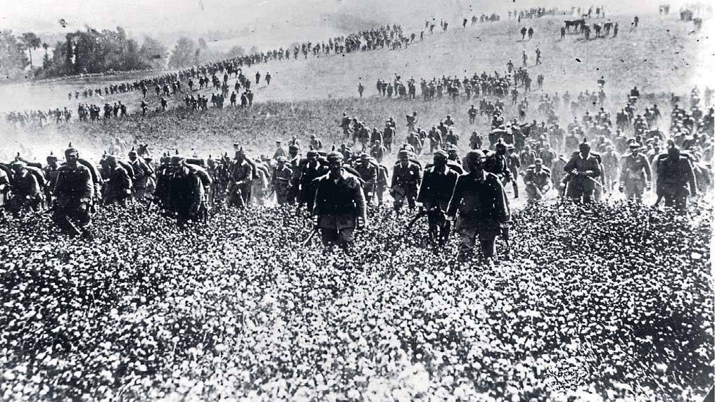 August 1914: German infantry advance across open country during the occupation of
Belgium.