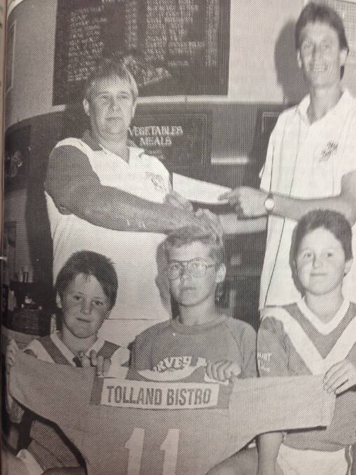 Turvey Park Wanderers president David Fulmer accepts the 1993 sponsorship package from Tolland Hotel Bistro manager Rod Porter. Matthew Bartley, Glen Stephens and Scott Bartley proudly show their shirts for the April 17 game.