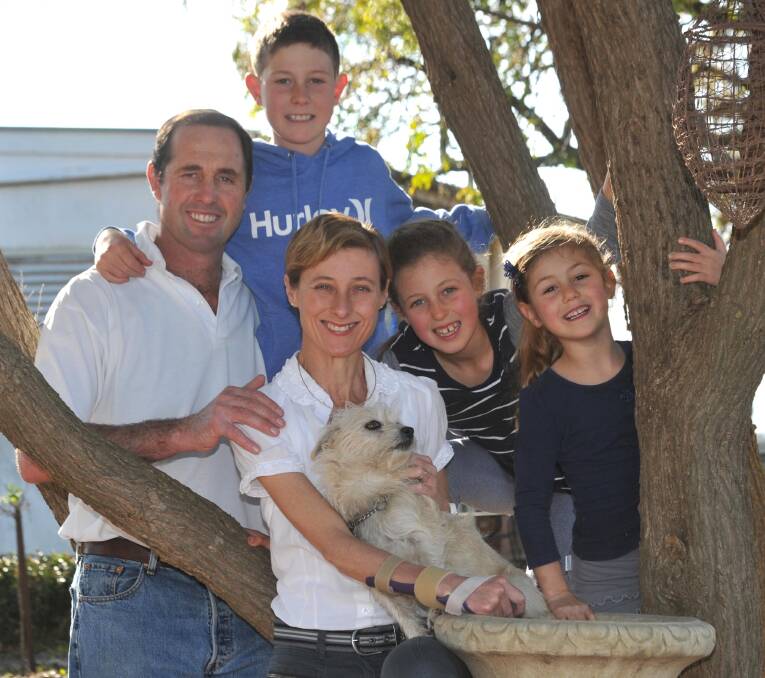 Geoff and Kim Hunt with children Fletcher, Mia and Phoebe in 2013. Photo: Les Smith