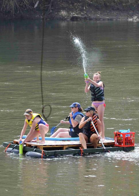 Floating along is Eliza Smith, 12, Molly Matthews, 11, Jodie Matthews and Mandy Wilcox. Picture: Michael Frogley