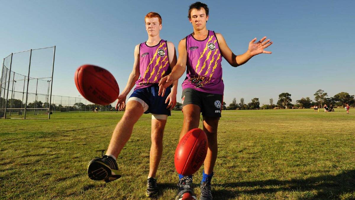 Training with Wagga Tigers are newcomers Shaun Bourshier and Mitch Hawker. Picture: Alastair Brook