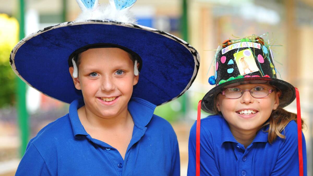 Lachlan Walford and Tara Kelleher, both 10, at the Tolland Public School Easter hat parade. Picture: Kieren L Tilly
