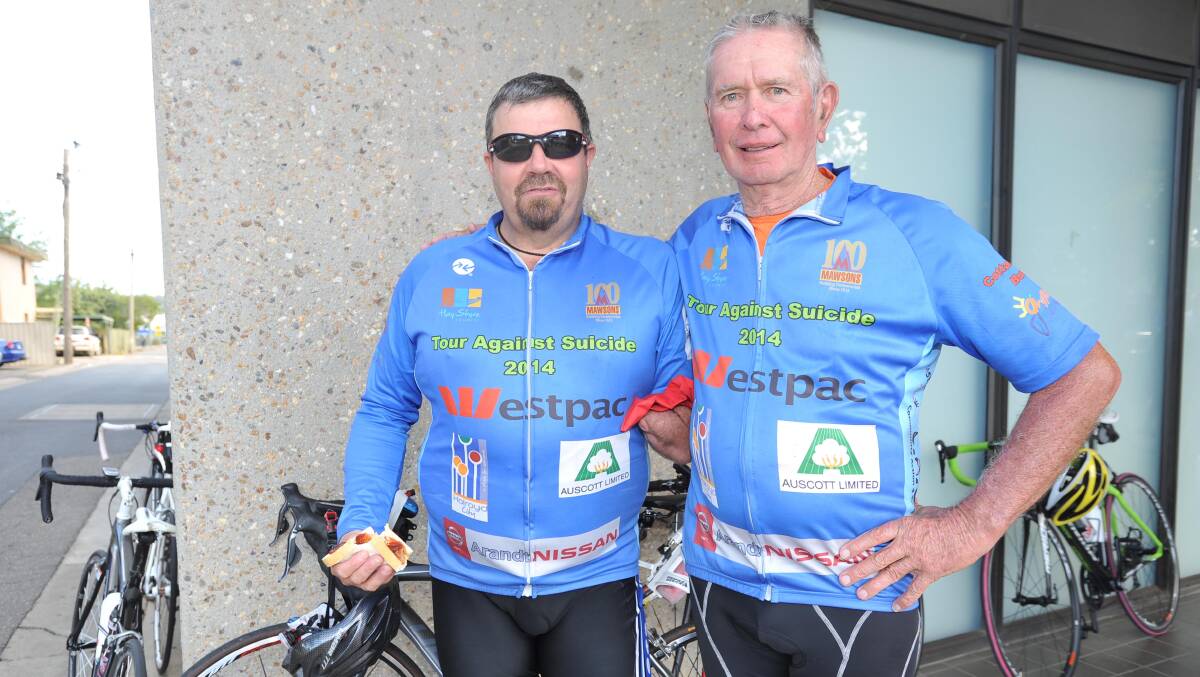 Hay's Jason Wall and Des Gallagher from Rochester, Victoria are two of the cyclists riding from Hay to Canberra for suicide awareness. Picture: Laura Hardwick