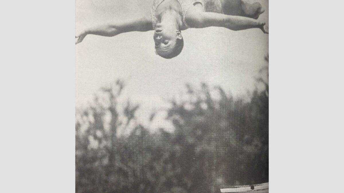 Penni Murphy shows the style that won her the under 16 diving championship at Kooringal High School's swimming carnival.
