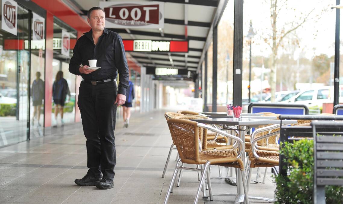 Owner of Wagga's Storehouse Cafe and Deli Simon Gulliford says paying to have outdoor dining is "tough going", but the ambience and advertising it gives is vital. Picture: Kieren L Tilly