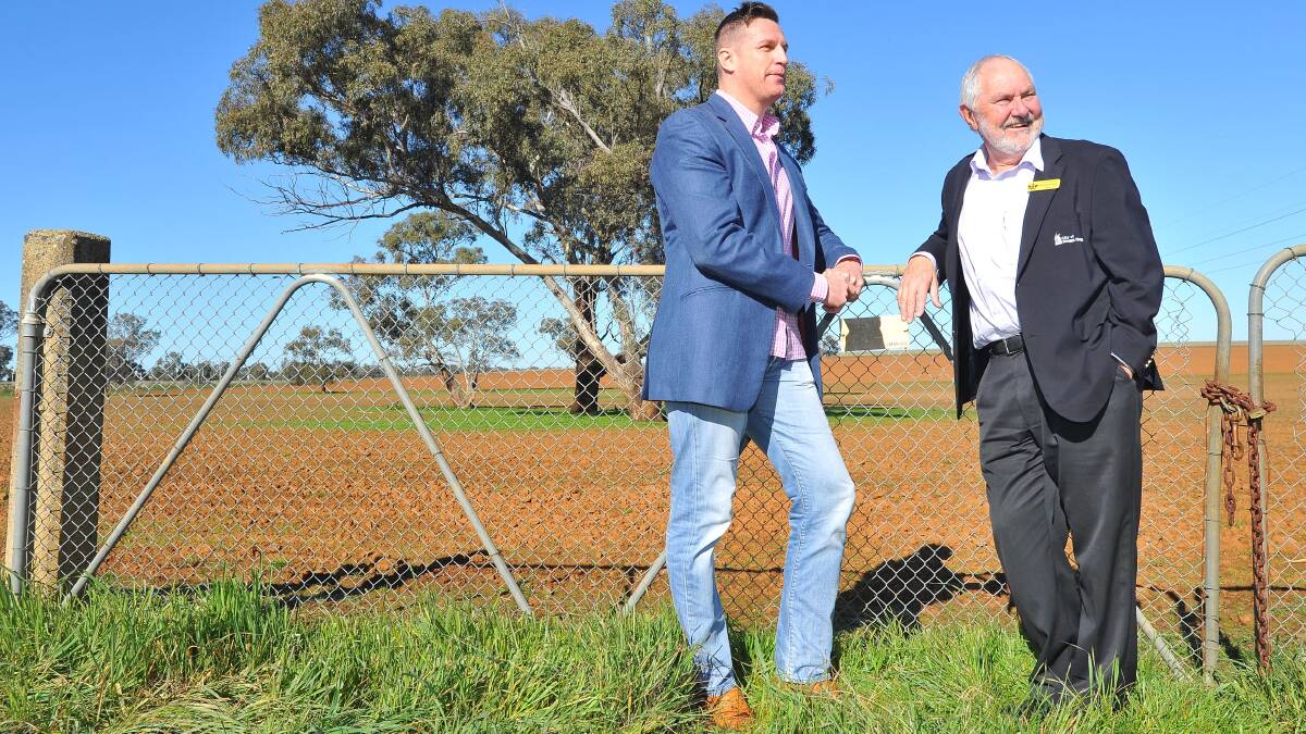 Traxion representative Sean Wilson joins mayor Rod Kendall at the prospective Riverina Intermodal Freight and Logistics hub site at Bomen. Traxion were recently announced as the preferred proponent to negotiate the development. Picture: Kieren L Tilly
