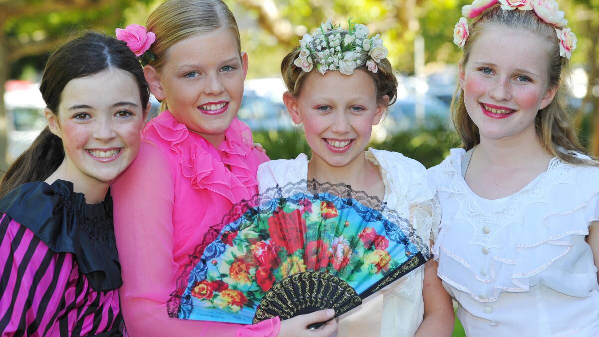 Amy O'Halloran,10, Madeleine Logan, 11, Hannah Billett, 11, and Caroline Smith, 10, - all from Wagga - look the part ahead of The Frog Prince play at the basement of the Civic Theatre. Picture: Kieren L Tilly