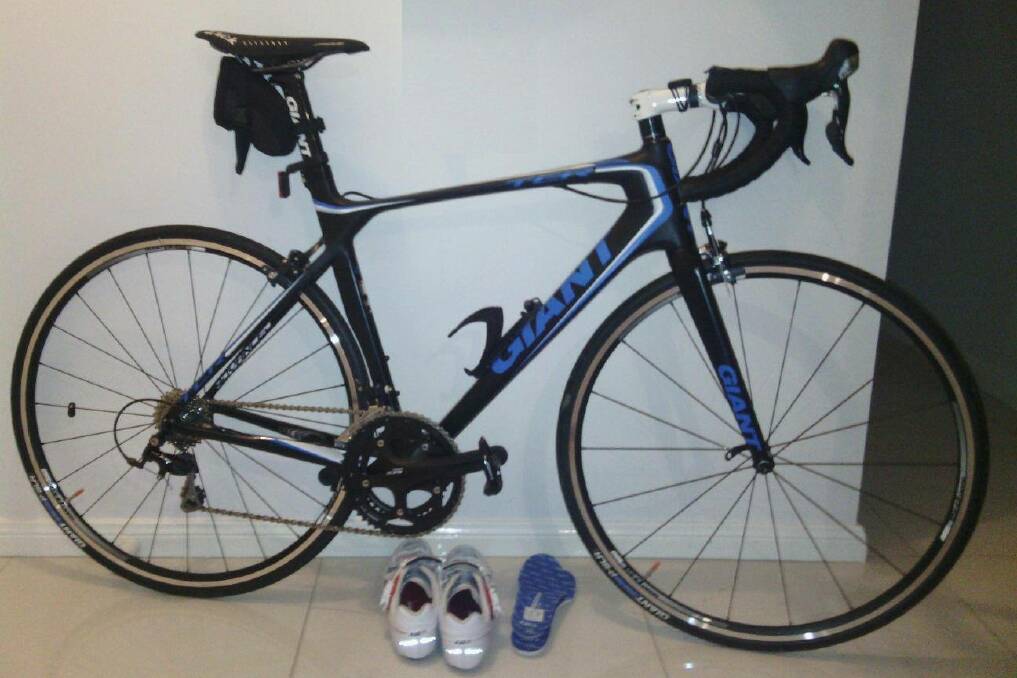 Police say this  men's racing bike, valued at $5000, was stolen from a Glenfield Park home on Friday.