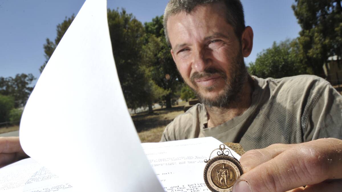 FAMILY TRACKED DOWN: Darren Blake holds a war medallion he found at Walla Walla in December. Picture: Les Smith