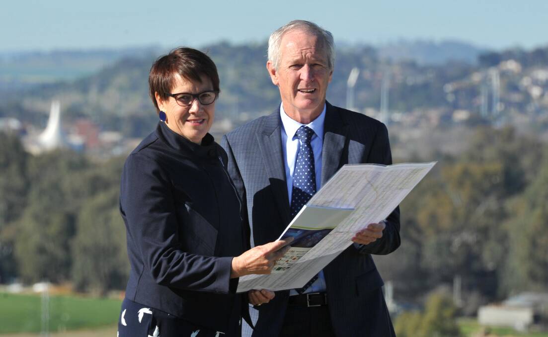 MAPPED OUT: Committee 4 Wagga (C4W) chairwoman Judy Galloway and chief executive Chris Fitzpatrick say the group's strategic plan will guide the city's growth. C4W has urged the community to help plan for the future now. Picture: Michael Frogley