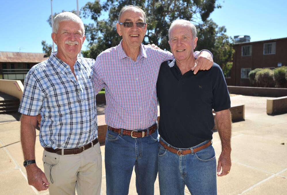 Neil Sowerby (Bangalow), Tony Gelling (West Wyalong) and Bill Barnett (Noosa) share some memories during the 50-year reunion of the Wagga Agricultural College's class of 1964. Picture: Laura Hardwick