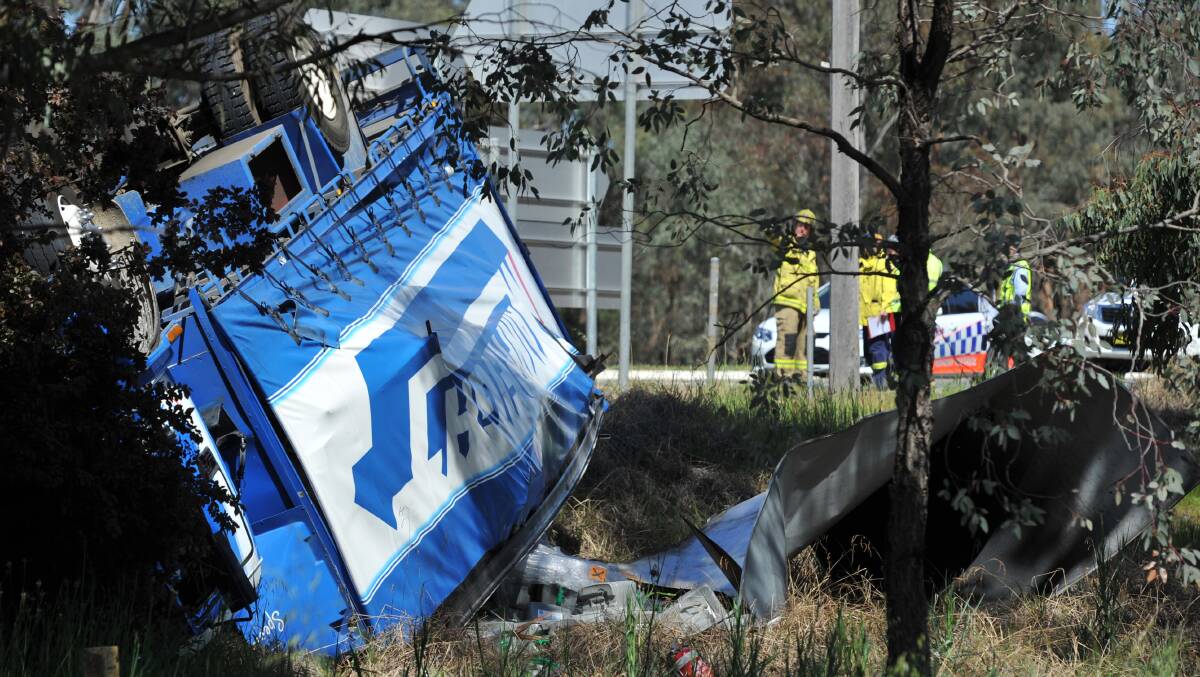 Emergency services worked for most of Monday to contain the spill and clear this truck that crashed at the intersection of the Sturt and Olympic highways in Wagga. Police say preliminary investigations indicate the truck was unregistered. Picture: Michael Frogley