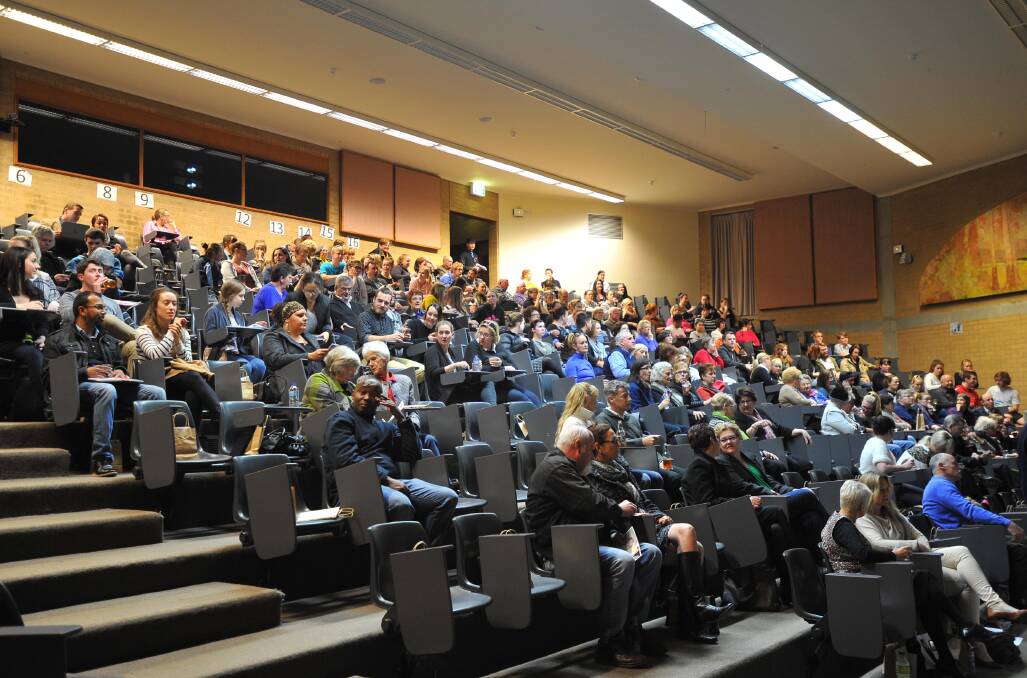 Lecturers, students, researchers and community members filed into the Wal Fife lecture theatre at Charles Sturt University. Picture: Kieren L Tilly