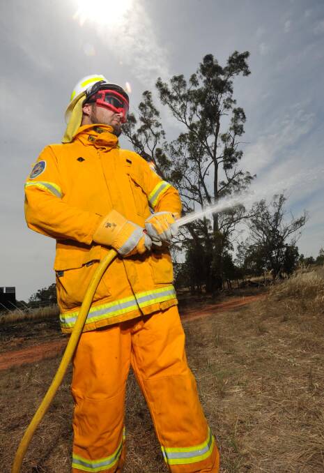 Temperatures in the Riveirna came close to their October records yesterday while Riverina Local Land Services trained people, including Peter Ingram, before the bushfire season.  Picture: Michael Frogley