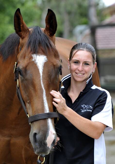 FRESH START: Rebeka Prest will make her professional riding debut at Tumut today after eight years as an amateur jockey. One of her rides will be on Wild Win for master Chris Heywood. 	Picture: Les Smith