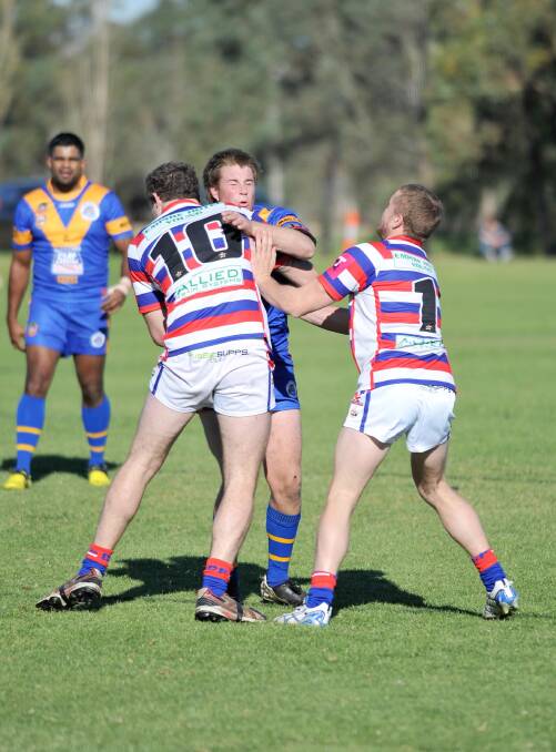Kyle Richens (left), pictured playing for Young in 2013, has returned to the club for the 2015 season.