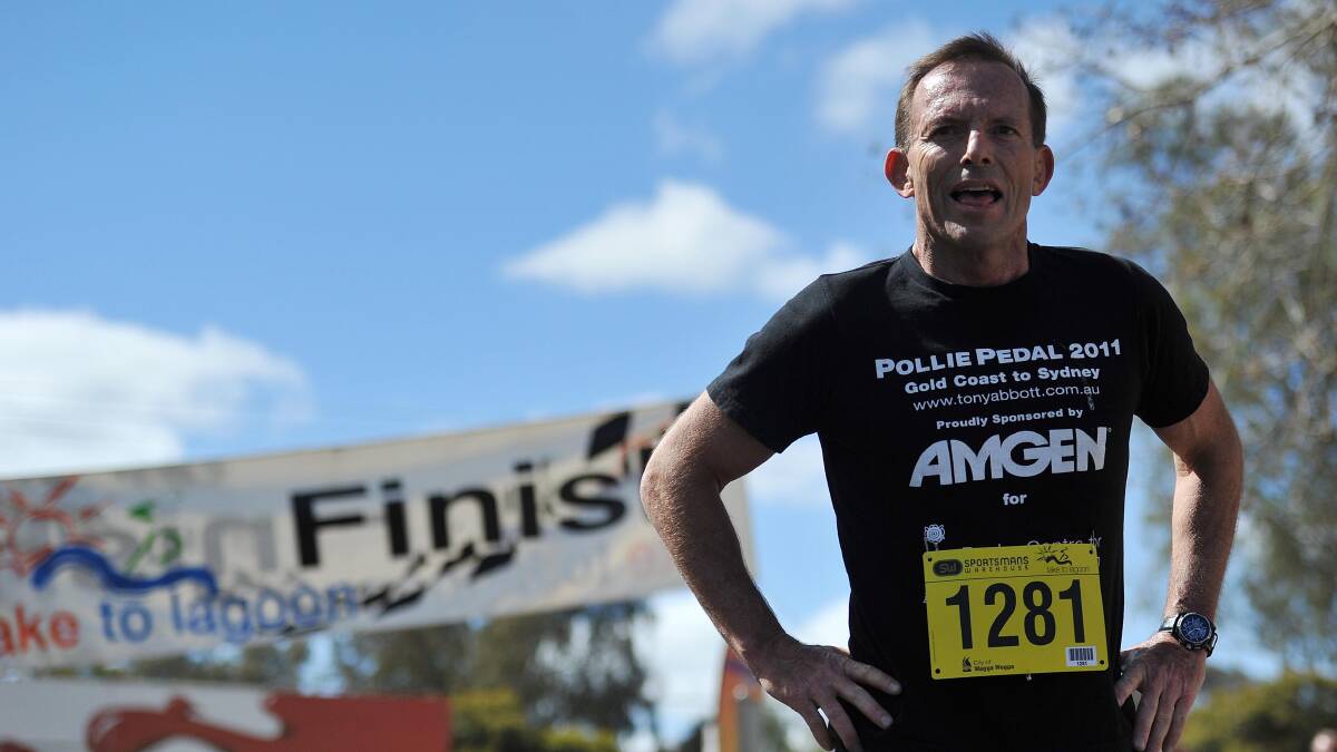 Australian Prime Minister Tony Abbott finishes the Lake To Lagoon in 2012, the last edition of the fun-run using the traditional route.