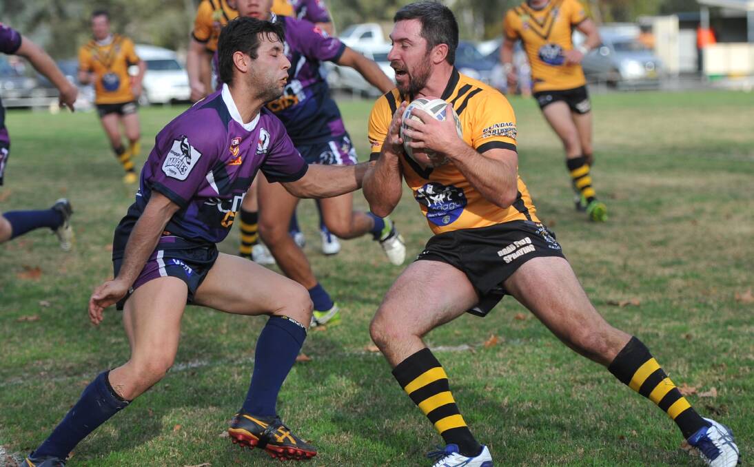 WAR OF THE ROSES: Southcity's Nathan Rose lines up Gundagai's Matthew Rose during the Bulls eight-point win at Anzac Park on Saturday. Picture: Laura Hardwick