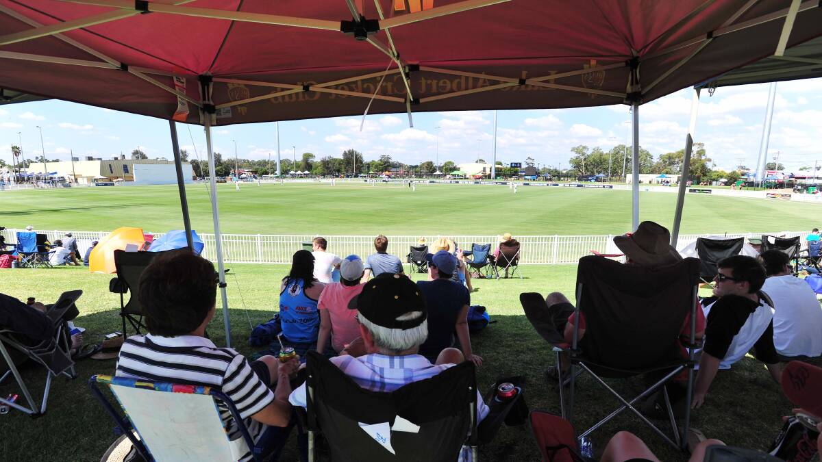 BIRDS EYE VIEW: Spectators watch all the Sheffield Shield action under the shade at Robertson Oval yesterday. Picture: Kieren L Tilly