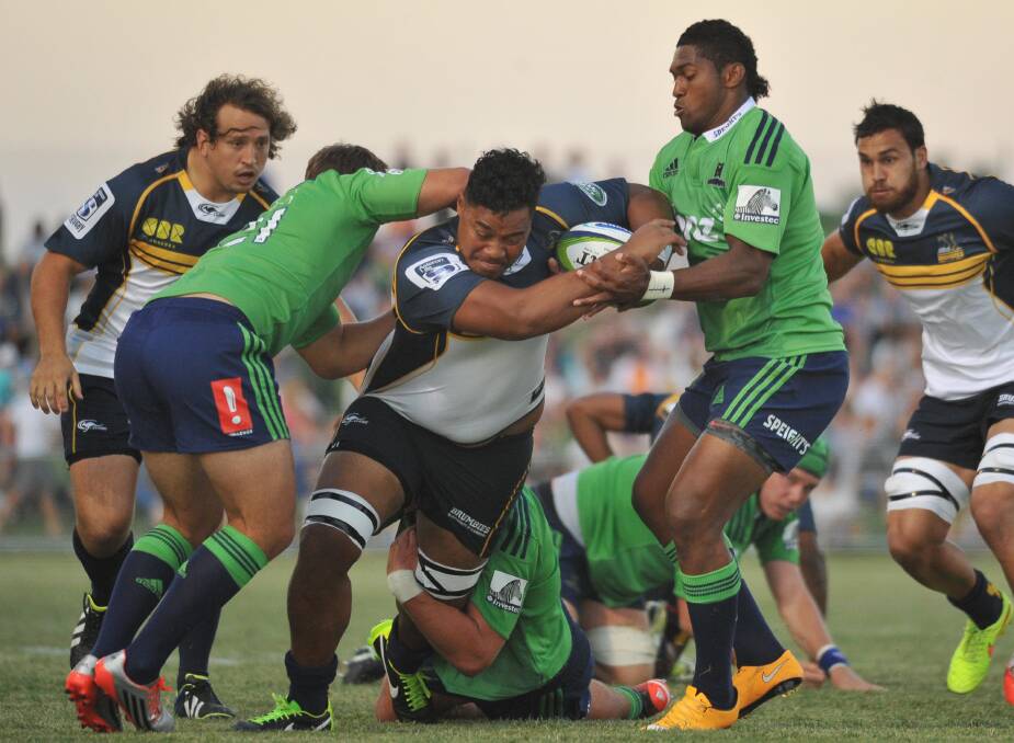 NO WHERE TO GO: Brumbies number eight Ita Vaea tries to charge through three Highlanders opponents druing the Super Rugby trial at Equex Centre on Saturday night. Pictures: Laura Hardwick