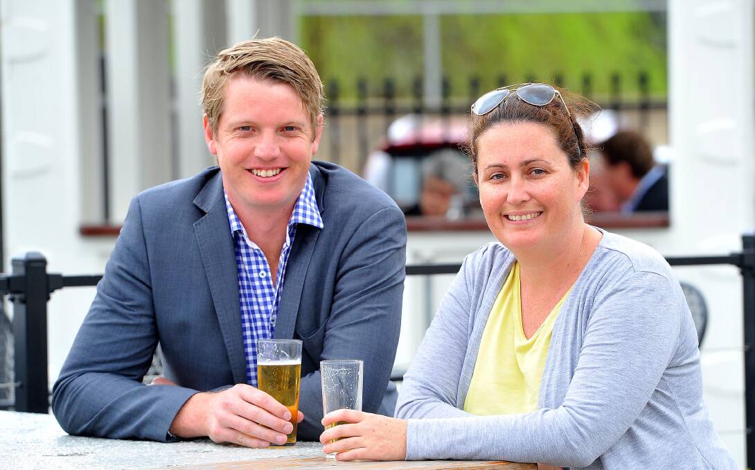 TASTING SUCCESS: Labor candidates Dan Hayes and Vanessa Keenan toast the very high likelihood of being elected to Wagga council. Picture: Kieren L Tilly