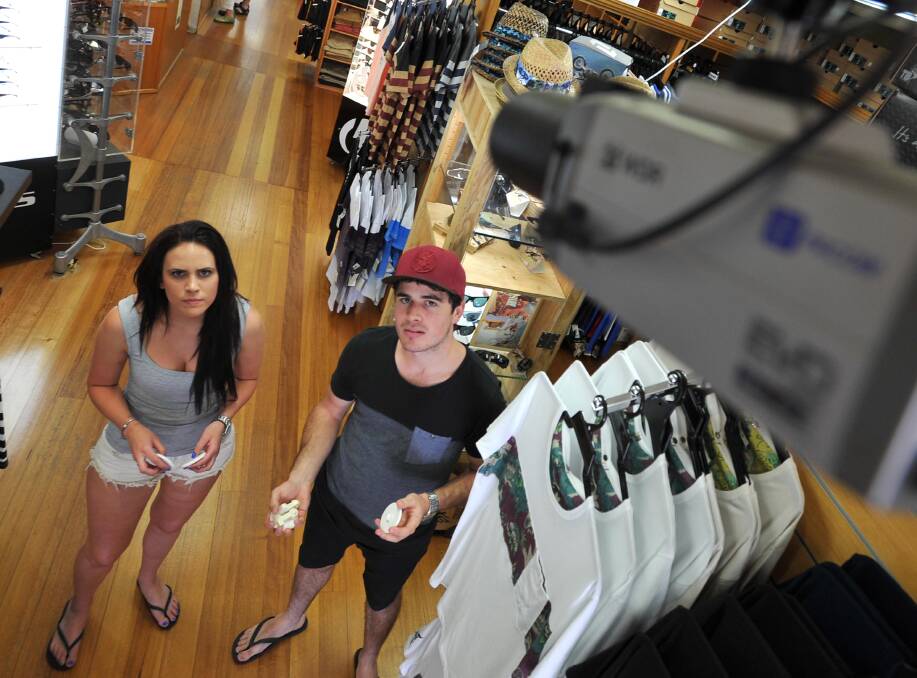 GOTCHA: Hannah Kennedy and Ben MacKenzie of Mark Anthony's Clothing highlight the use of security tags and CCTV. 