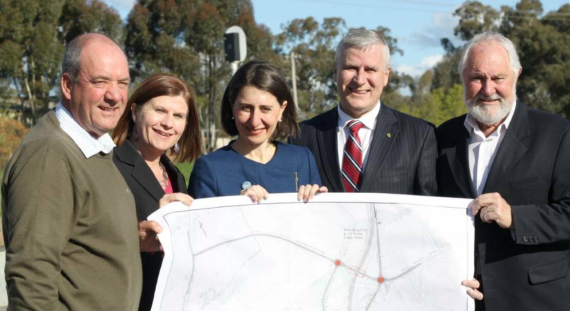 Wagga MP Daryl Maguire, Wagga council community sector manager Janice Summerhayes, NSW Treasurer Gladys Berejiklian, federal MP Michael McCormack and former mayor Rod Kendall in August. Ms Berejiklian was in Wagga to hand over $8.3 million in state funding for Bomen roads, laying the platform for a freight hub. 