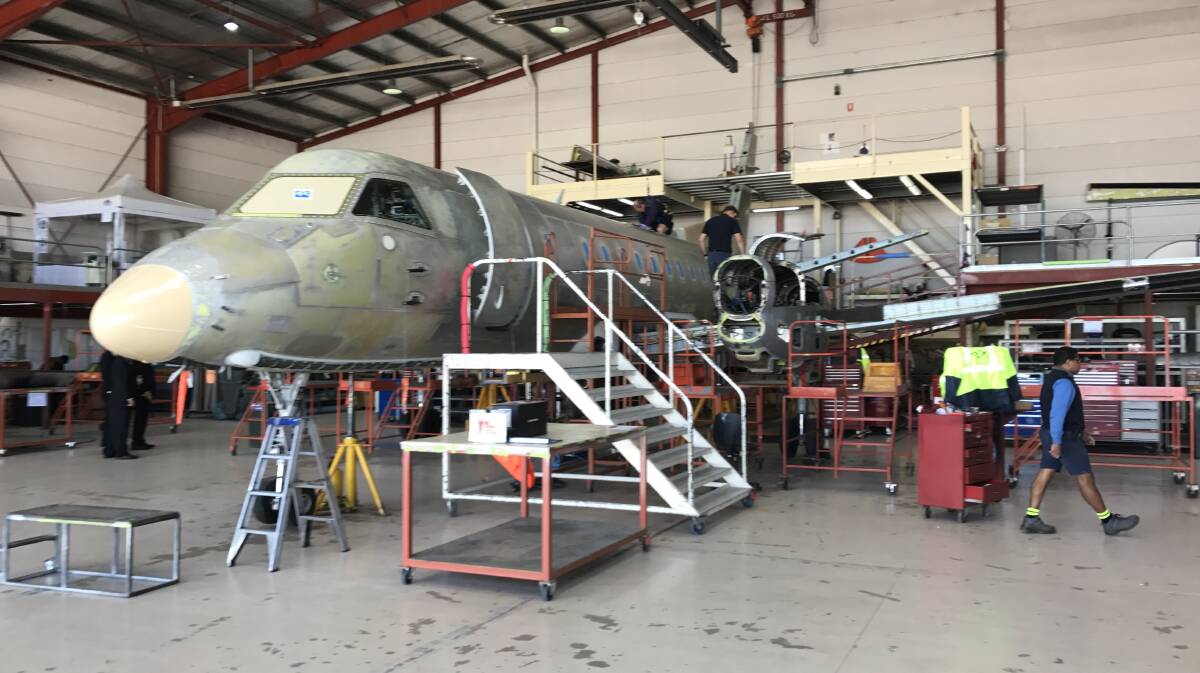 A Regional Express plane under maintenance in Wagga on Friday.